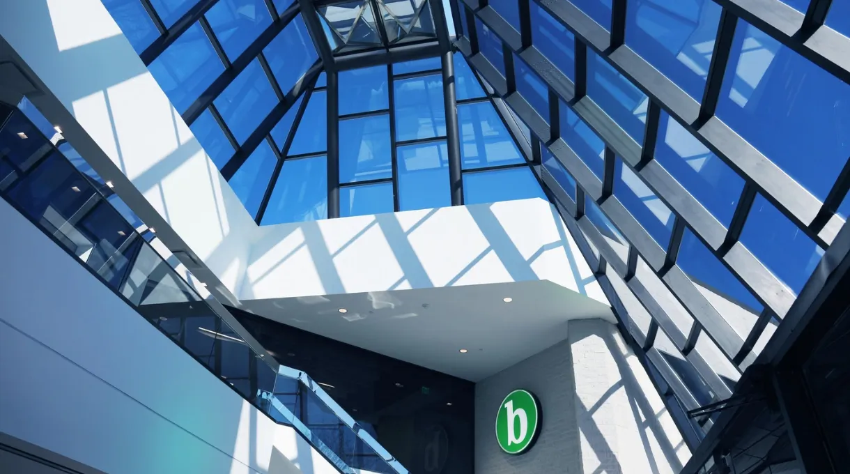 The glass atrium lobby of a Broadway National facilities office